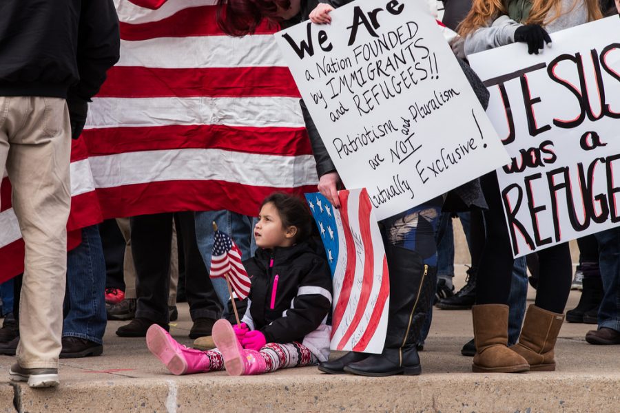 In 2017, thousands of Americans protested the travel ban at airports throughout the nation. 
Creative Commons