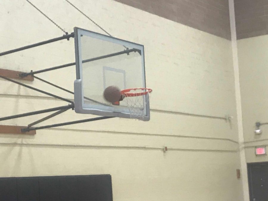 Basketball hoop located in the small gym.