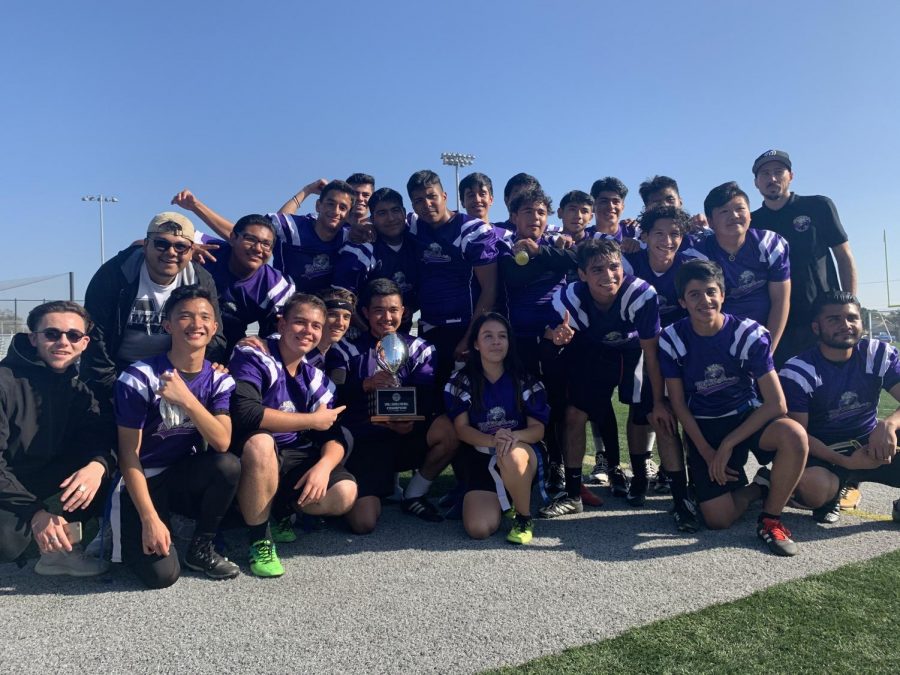 The Middle College flag football tournament cerebrates their victory in the small school flag football team.