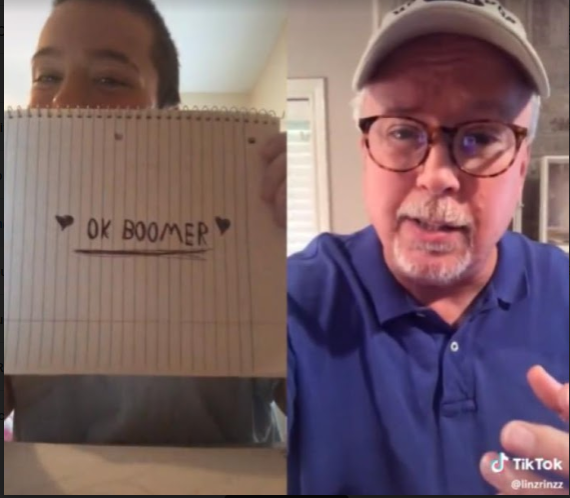 TikTok user lin@linzrinzz holds up a piece of notebook paper that reads OK BOOMER while an older man wearing a baseball cap insults millennials and the Generation Z.