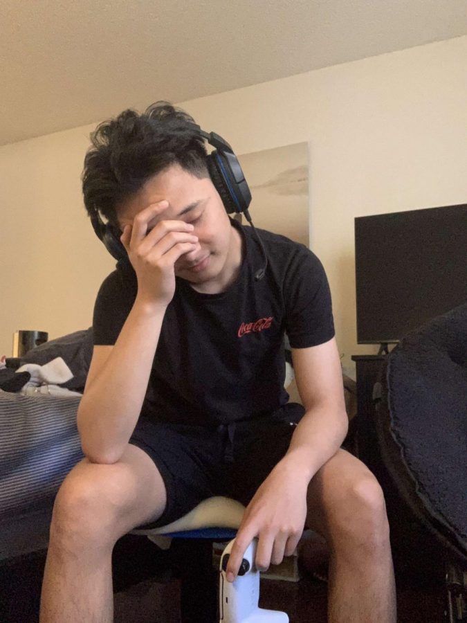 Frustrated gamer becomes overwhelmed with disappointment by what he’s playing.
