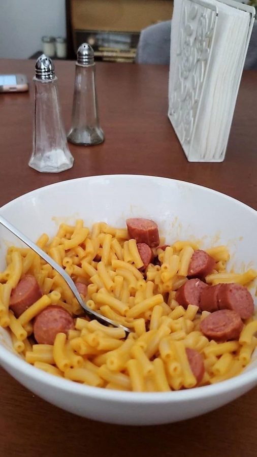 Sophomore Zachary Elsons favorite food combination, mac and cheese and weenies, looks delicious on his dining room table.