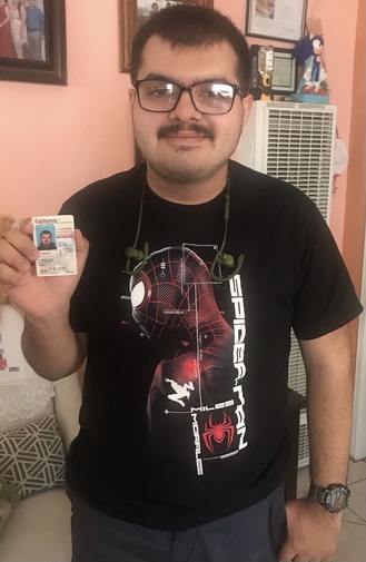 Senior Joseangel Regalado, shows off his license after passing the test.