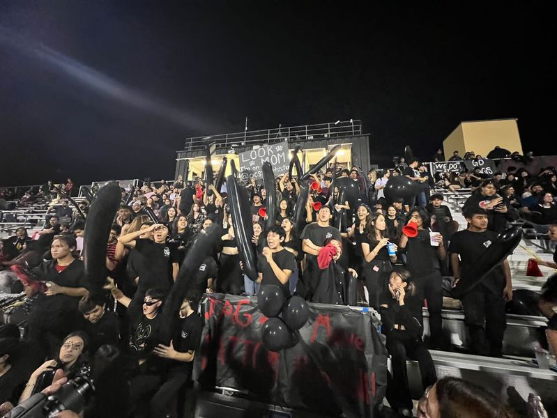 Students+at+Segerstrom+High+School+support+their+football+team+in+a+game+vs.+Trabuco+Hills+by+dressing+in+the+theme%2C+all+black.
