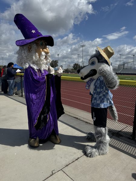 Middle College High School and Circulos High School mascots meet up at the soccer tournament.