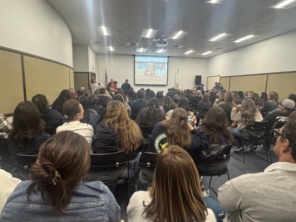 Santa Ana Unified School District staff gather at the board meeting on January 28 to speak publicly on the layoffs.